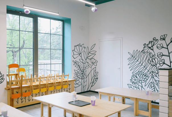 Personalised wall graphics of plants in an art classroom  