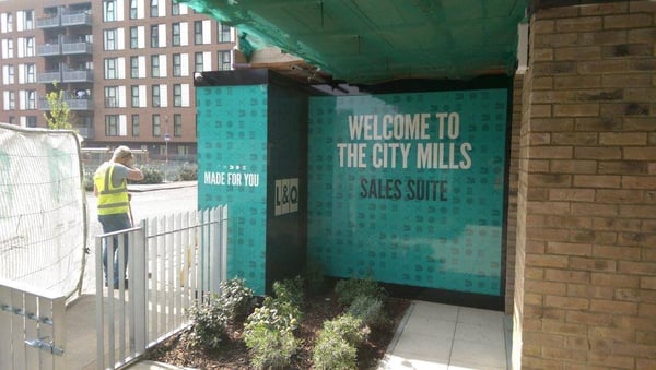 Storefront window graphics for an outdoor display in heavy foot traffic area