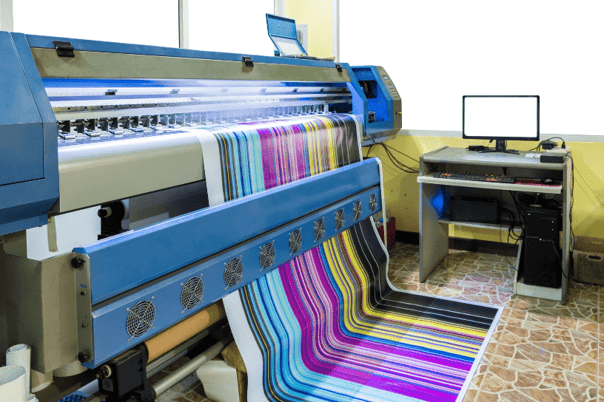 An industrial printer, printing a colourful design on a sheet, in large scale. 