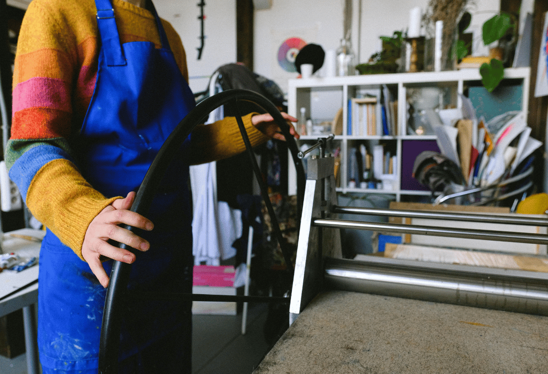 Rolling out a large format print to ensure that it is flat on a surface