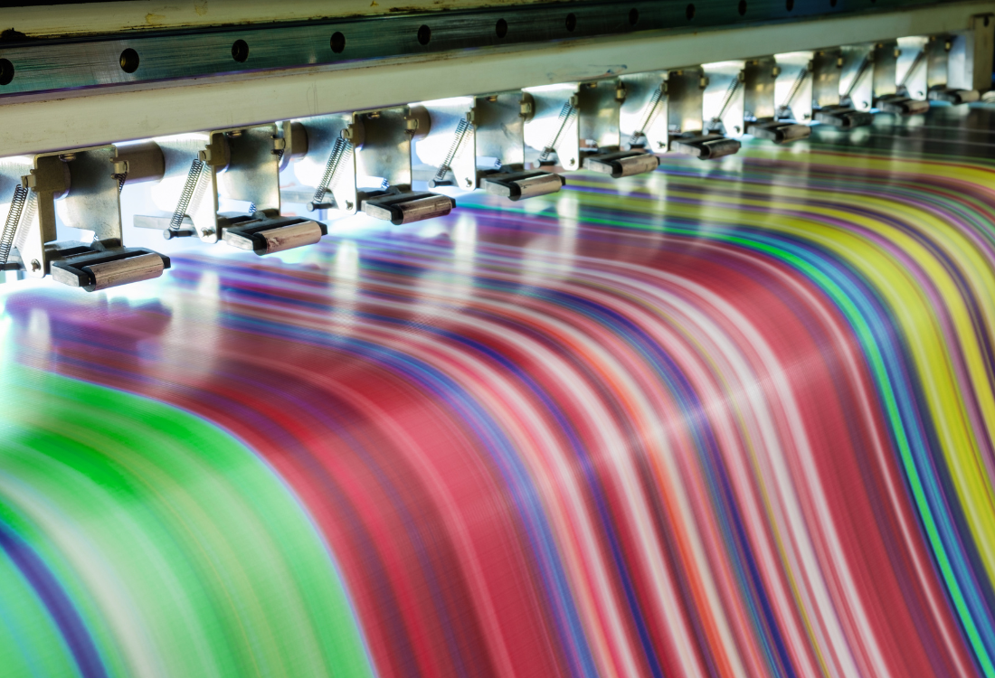 Both small and large format printing coming out of a machine